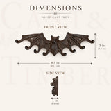 Cast iron bat wall rack detail